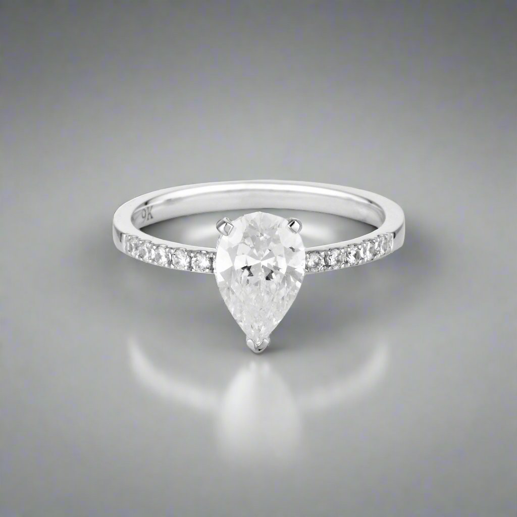 Georgini Gold Pear Cut And Round Brilliant 1.5ctw Moissanite Engagement Ring In 9ct White Gold